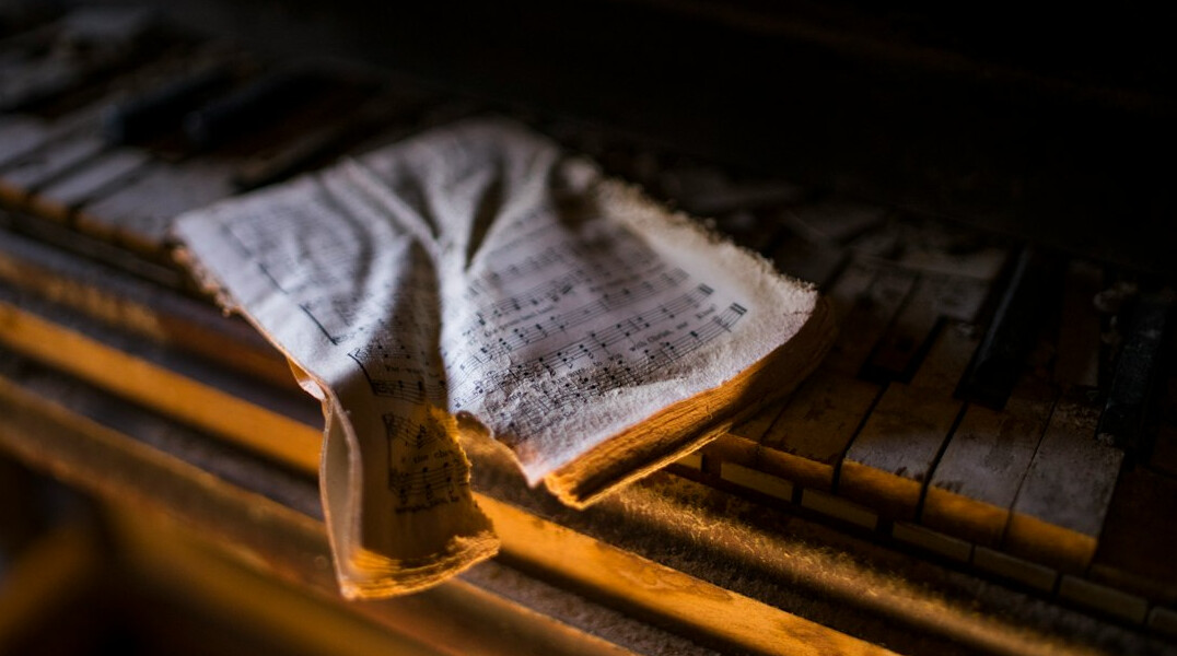 Magnifying glass resting on old documents