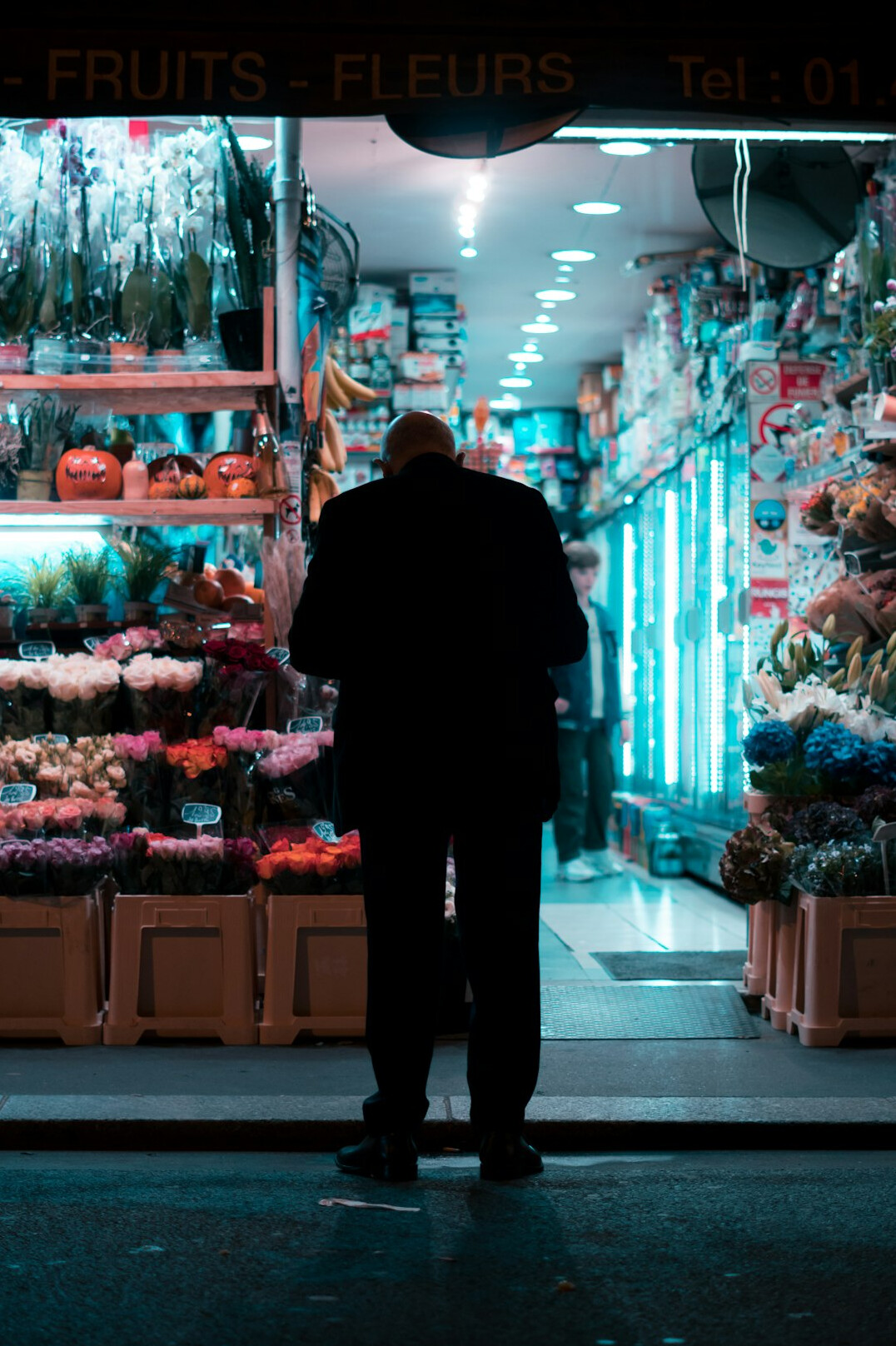 store security guard monitoring aisle